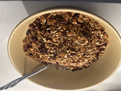 Small-batch granola in a warm cream ceramic bowl